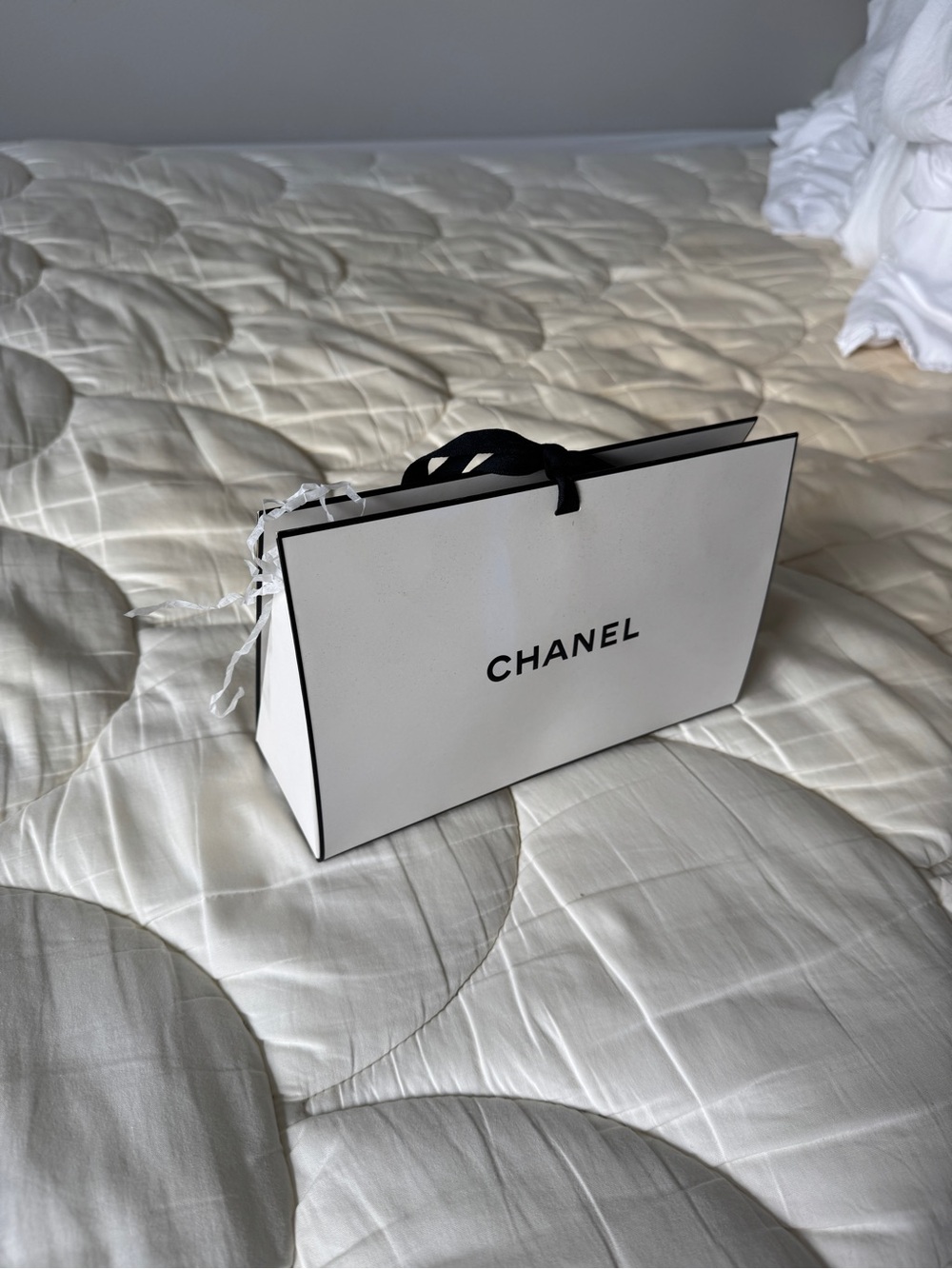 CHANEL White Tote-Style Gift Bag with Black Trim and Ribbon